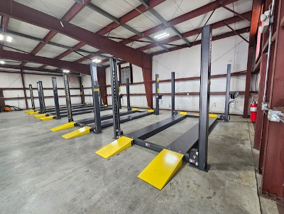 Garage with many Amgo car storage lifts